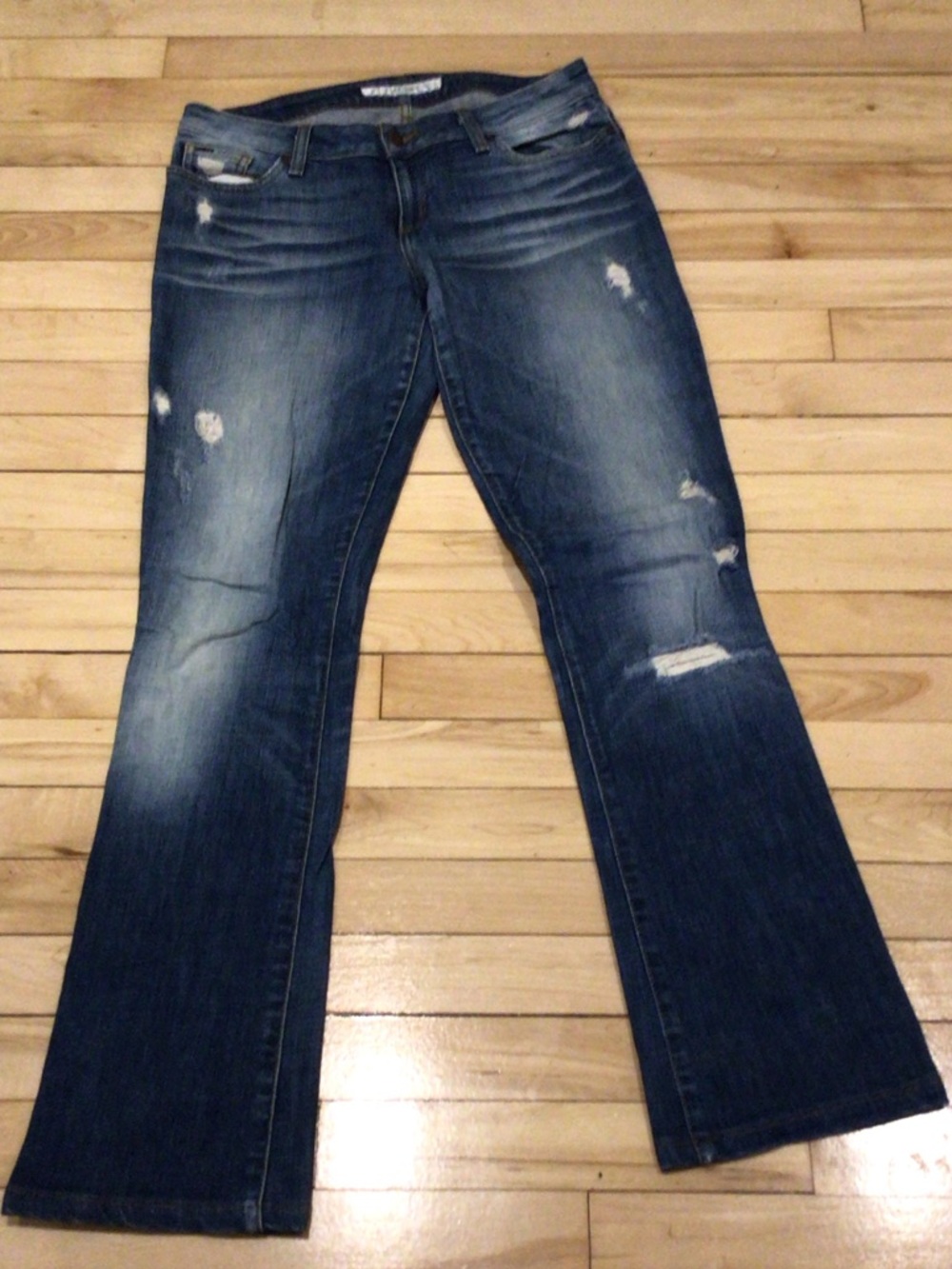 Flattering bootcut Joe's Jeans Medium Wash Distressed Jeans